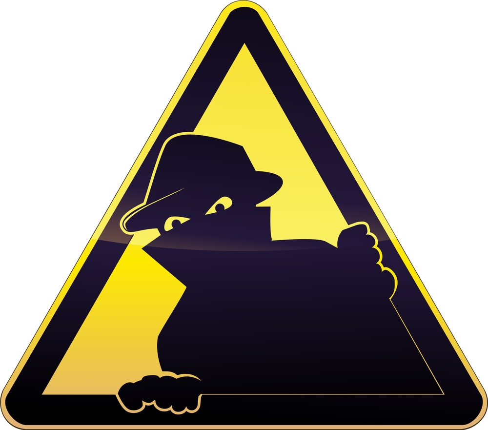 Yellow,And,Black,Triangular,Burglary,Warning,Sign,On,Which,A